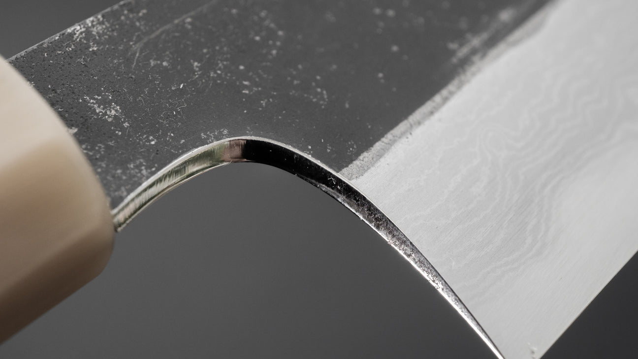 Hitohira Togashi Wit #1 Damascus Kurouchi Gyuto 240 mm ebbenhouten handvat