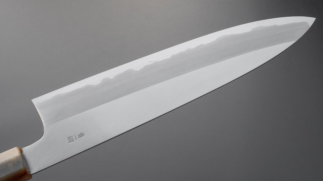 Hitohira Togashi Blue #1 roestvrij beklede Gyuto 240 mm Taihei Makassar ebbenhouten handvat