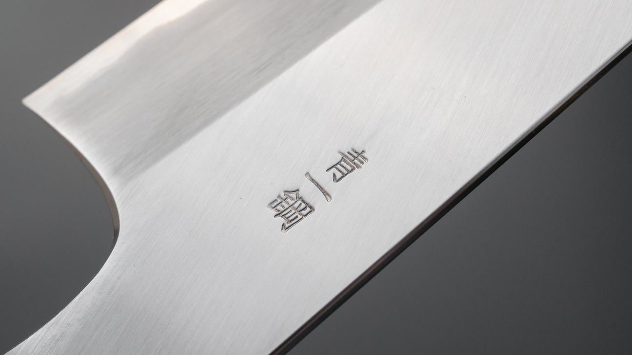 Hitohira Togashi Blue #1 roestvrij beklede Gyuto 240 mm Taihei Makassar ebbenhouten handvat