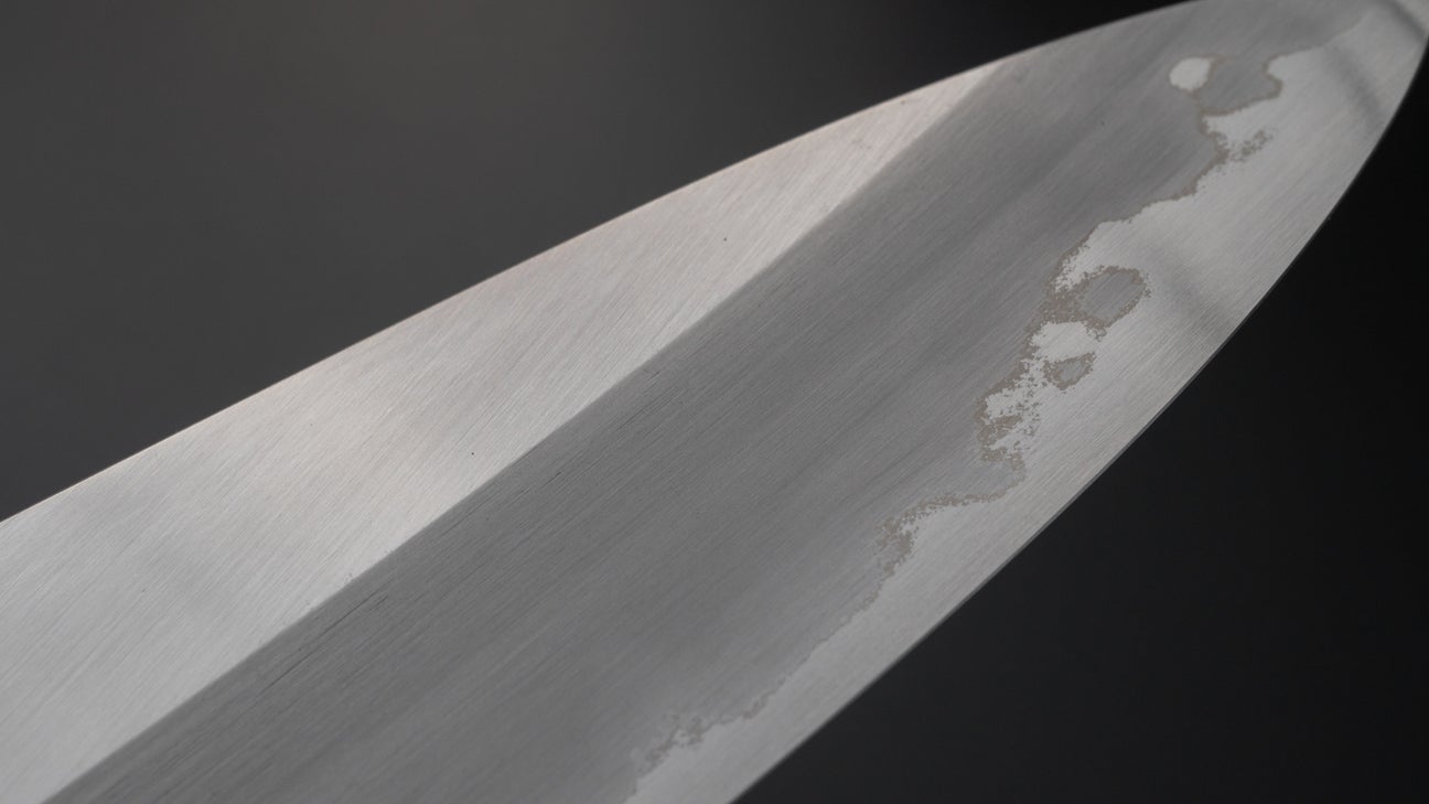 Hitohira Togashi Blue #1 roestvrij beklede Gyuto 240 mm Taihei Makassar ebbenhouten handvat