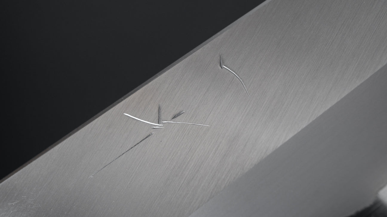 Hitohira Togashi Blue #1 Stainless Clad Migaki Santoku 180mm Taihei Makassar Ebony Handle